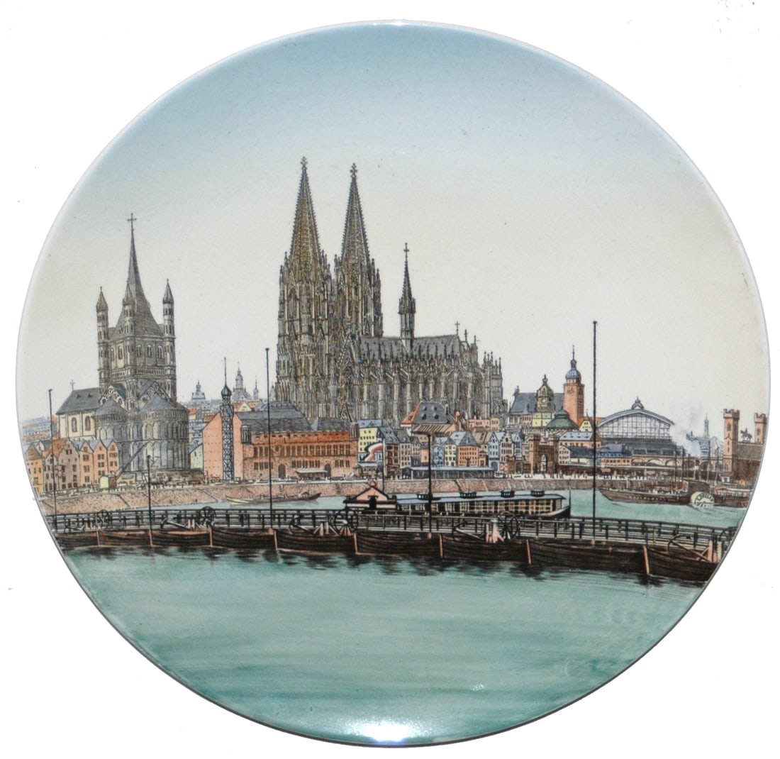 Mettlach 15" Plaque, Coin a. Rh. Riverside View: Mettlach #1044/157 PUG 15" Plaque. "Coln a. Rh. Riverside Town Scene. Mint.