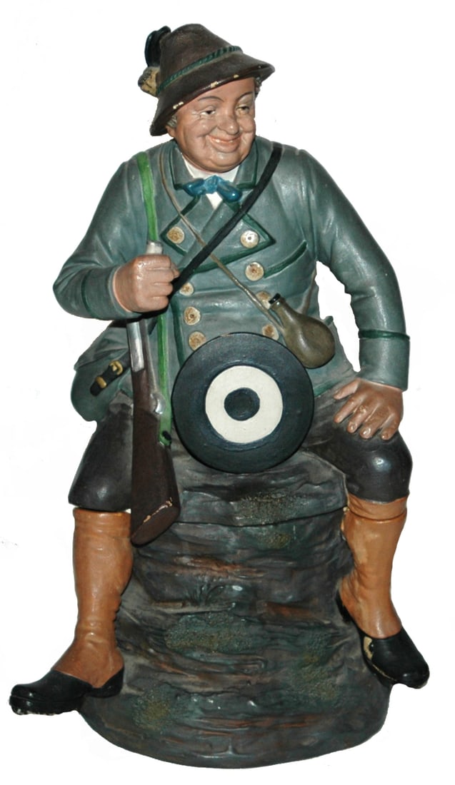 Terracotta Hunter w Target & Rifle Tobacco Jar: Terracotta 12" Tobacco Jar. Hunter sits with target and rifle. Normal wear.