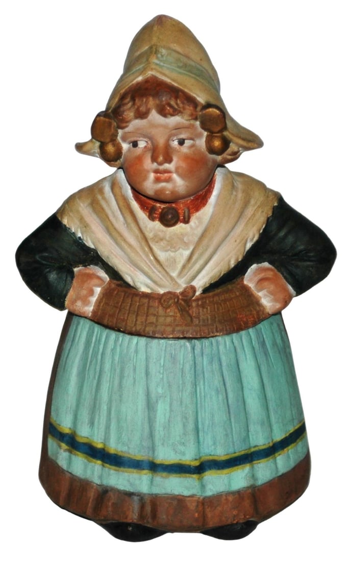Terracotta Dutch Girl Tobacco Jar: Terracotta 8 ¼" Tobacco Jar. Dutch girl wear apron. Very good condition.