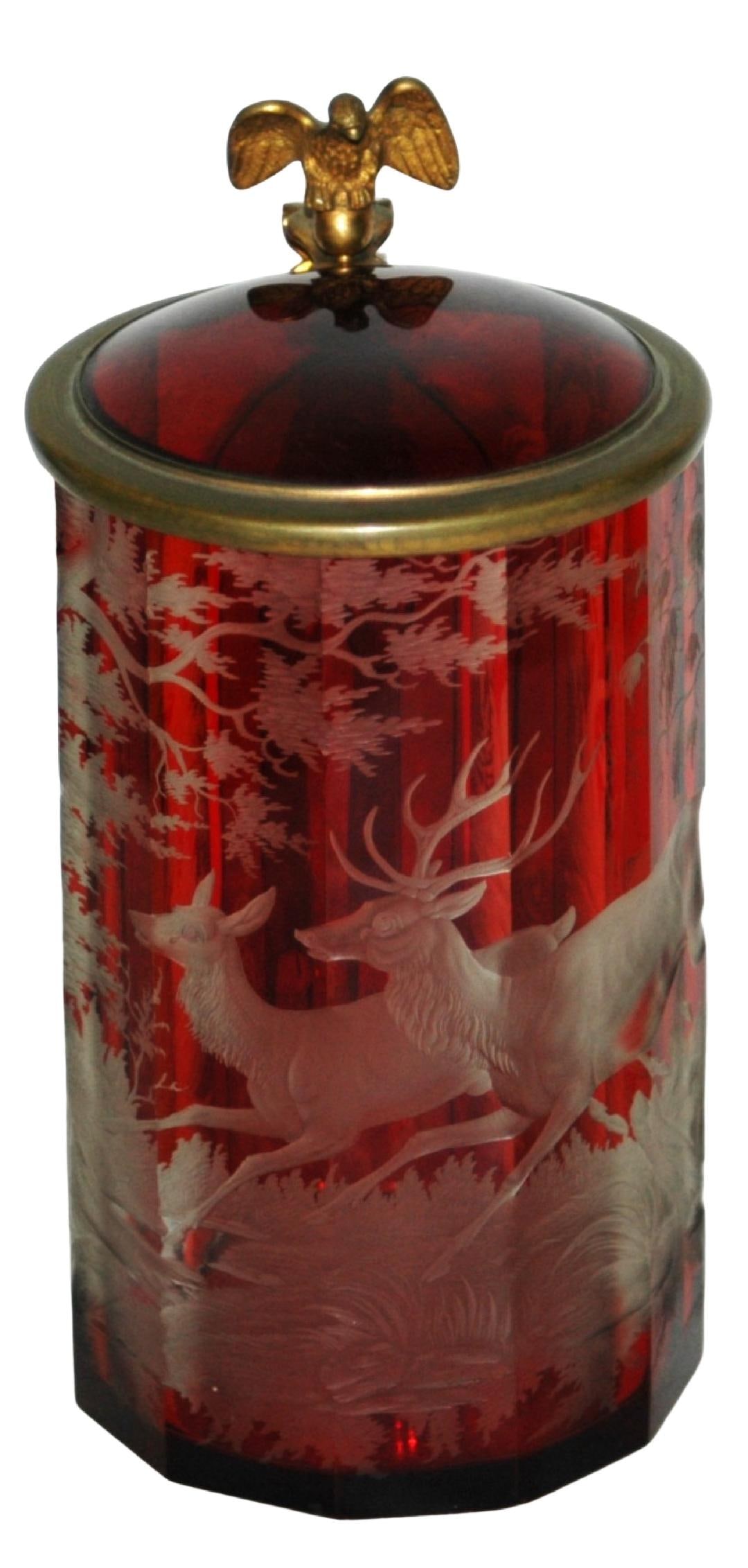 1L Intaglio Cut Stags in Forest Glass Stein c.1850: Blown Glass 1L. Ruby stained and intaglio cut running stags in the forest. Matching glass inlay lid with brass mount. Bohemian circa 1850. Mint.