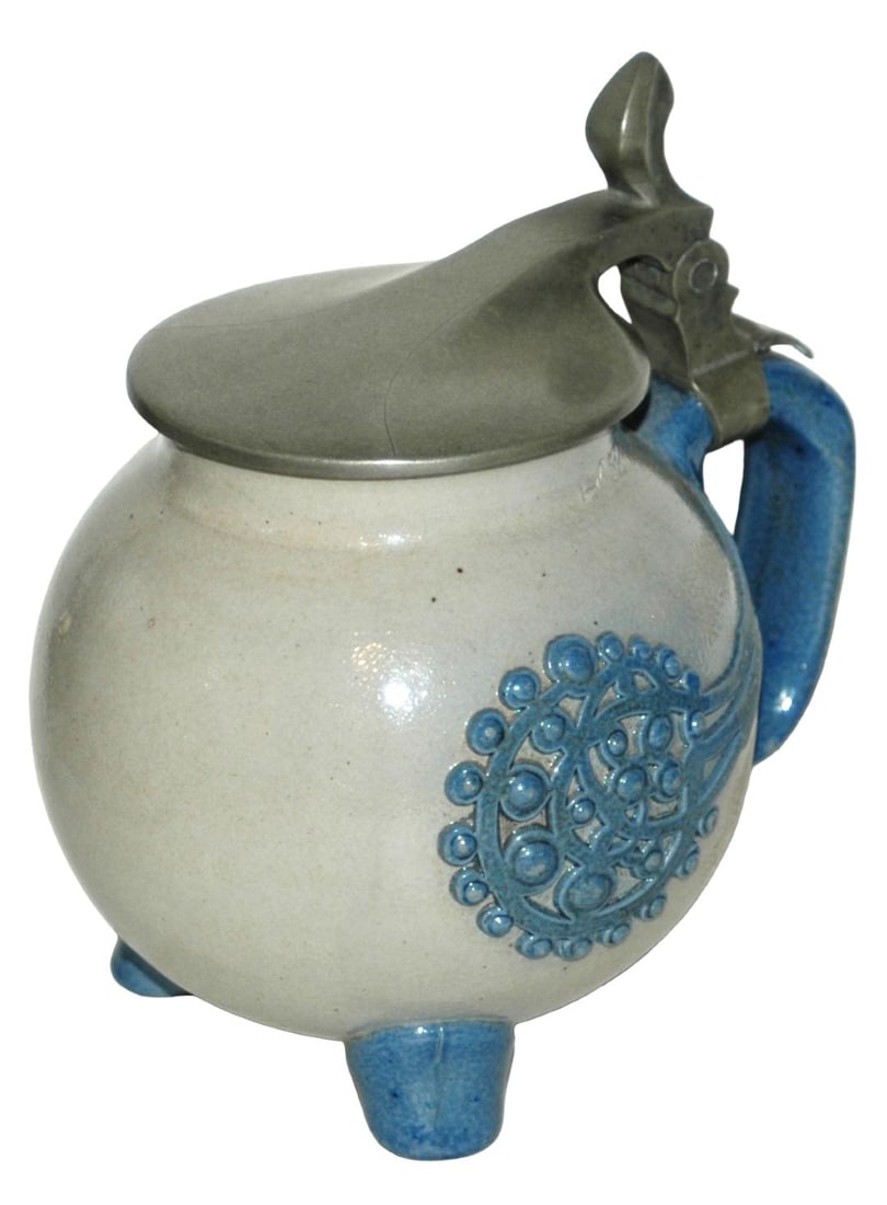 Riemerschmidt Art Nouveau Floral Footed Stein: Stoneware #1757 Relief 1/2L. Richard Riemerschmidt Art Nouveau floral design on three feet. Mint.