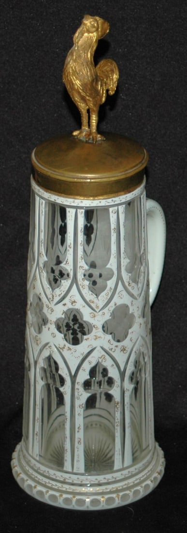 Overlay Glass Gilded Enamel Stein w Brass FInial: Blown Overlay Glass 1/2L. White over clear. Gilded enamel design. Brass mount with rooster finial.
