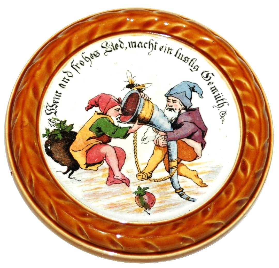 Mettlach Coaster, Dwarfs w Drinking Horn: Mettlach #1032 PUG 5” Coaster. Dwarfs hold drinking horn. Mint.