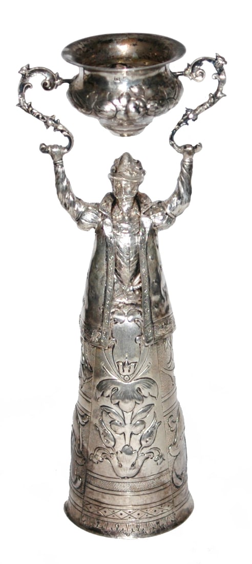 12" Silver Hallmarked Floral Design Wedding Beaker: Silver 12” Wedding Beaker. Man wears coat. Hand chased floral design. Silver hall marks on top bowl and skirt. Mint.