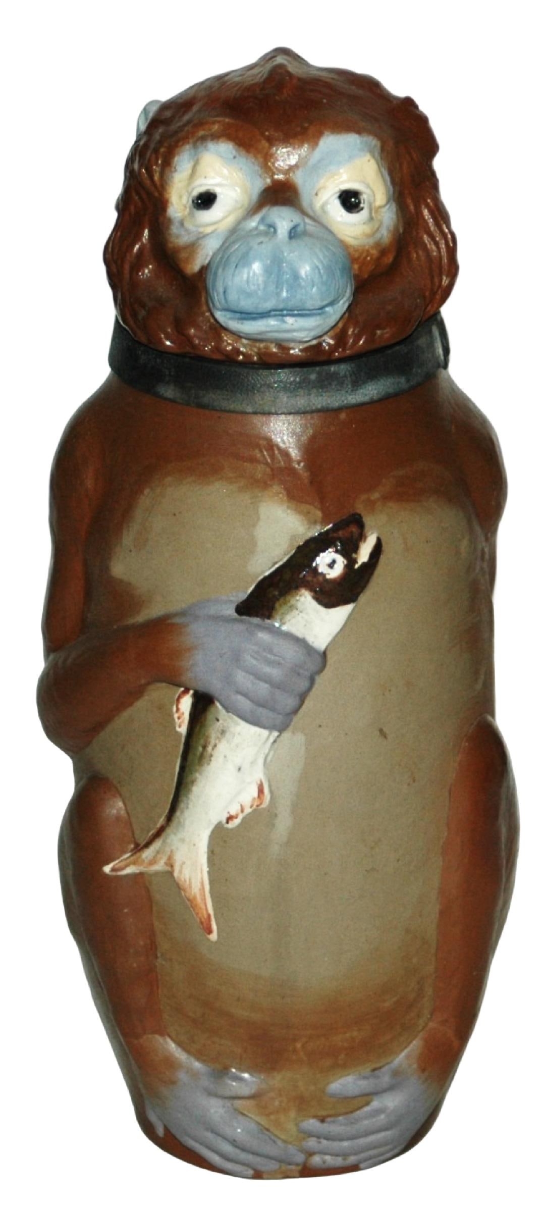 Mettlach Monkey w Fish Character Stein: Character Stein 1/2L Mettlach #2069. Monkey stands holding a fish. Mint.