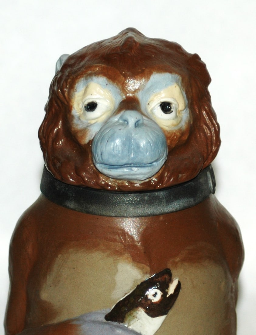 Mettlach Monkey w Fish Character Stein - 2