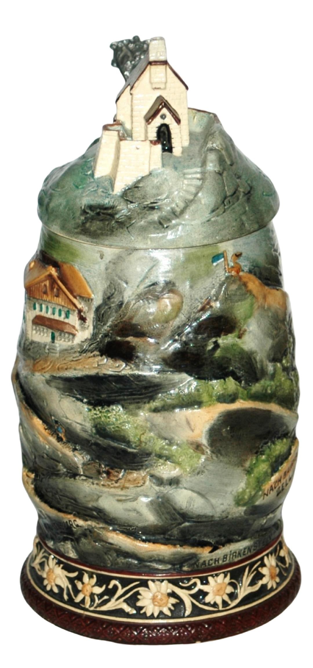 1L Mountain w Edelweiss Base Stein w House Inlay: Character Stein 1L Pottery. Mountain with building on inlay. Dragon handle. Edelweiss flowers around base, Mint.