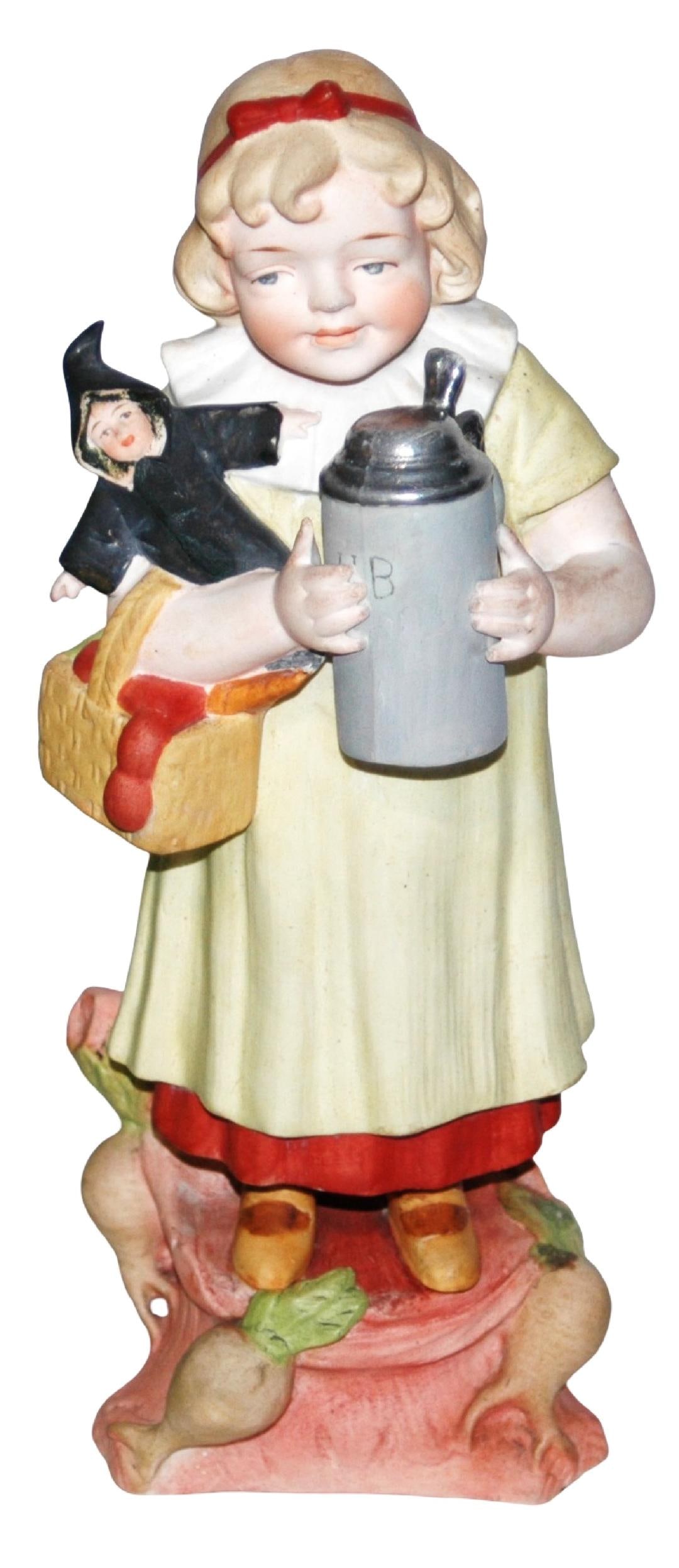 Heubach 12" Girl w Munich Child Doll& Large Stein: Heubach Porcelain 12" Figure. Girl holds Munich Child doll and large stein. Mint.