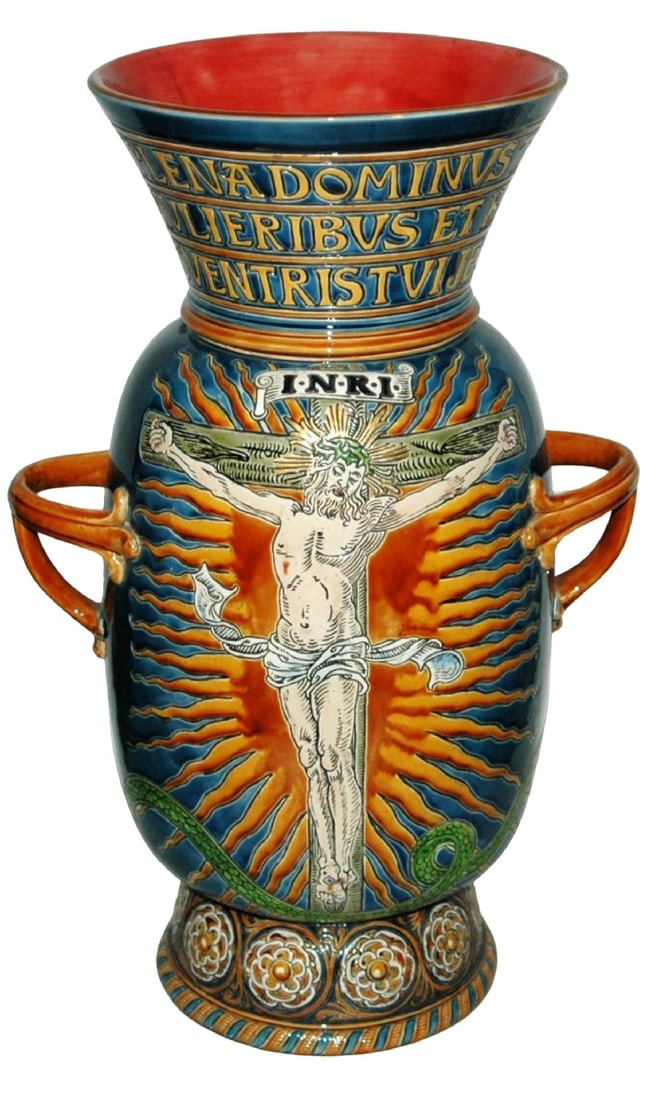 RARE Mettlach 17" Vase Crucifixion, Mary & Child: Mettlach #1826 Etched 17” Vase. Crucifixion scene on one side and Mary with the Christ child on the other. Two loop handles. RARE.