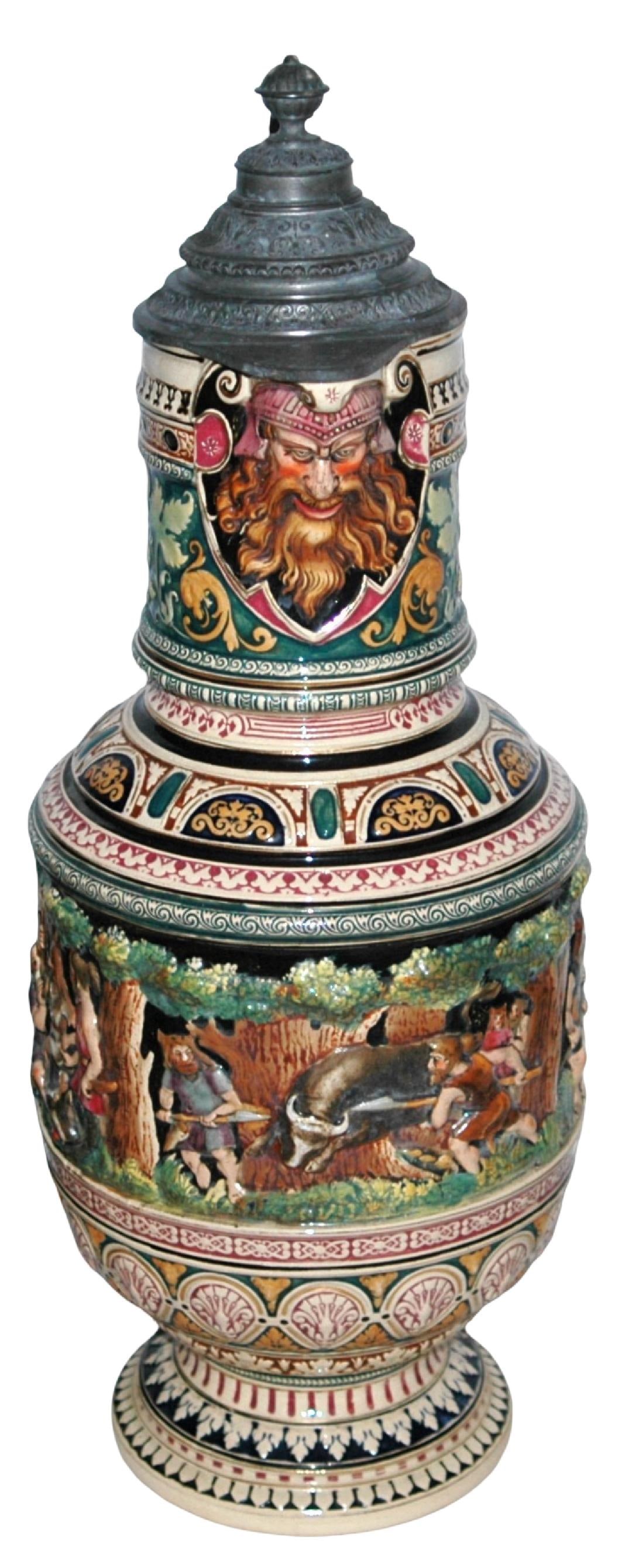 Impressive 5L Hunters Scenes Stein w Snake Handle: Pottery Dumler & Breiden #22 Relief 5L. Detailed scenes of early hunters. Bearded spout and figural serpent handle. Impressive.
