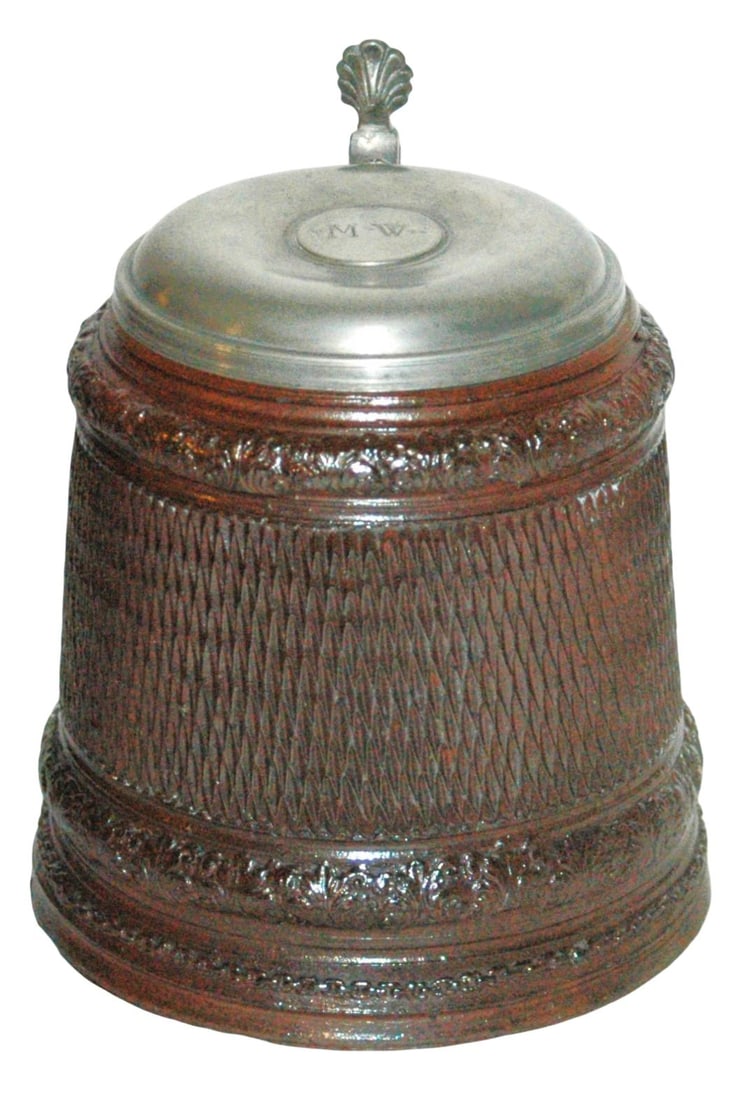 1-1/2L Creussen Chipped Carved Stein c.1630: Stoneware Stein 1 1/2L Creussen Factory. Chipped carved design with two floral applied relief body bands. Circa 1620-30.