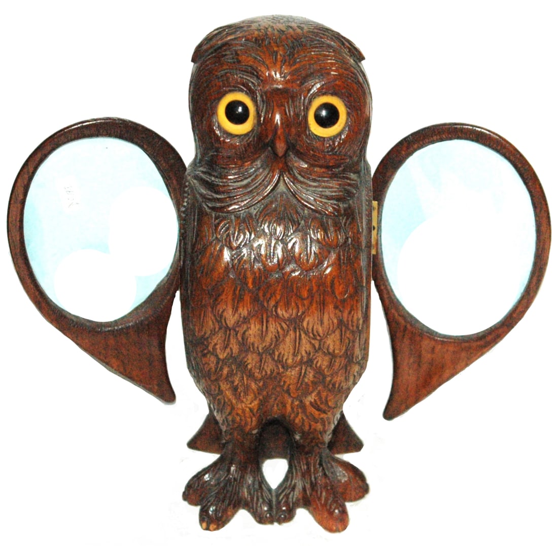 Black Forest Carved Owl Picture Frame w Glass Eyes: Black Forest Carved Wood 13” Owl. It has glass eyes and opens its wings for photos to go in. Impressive.