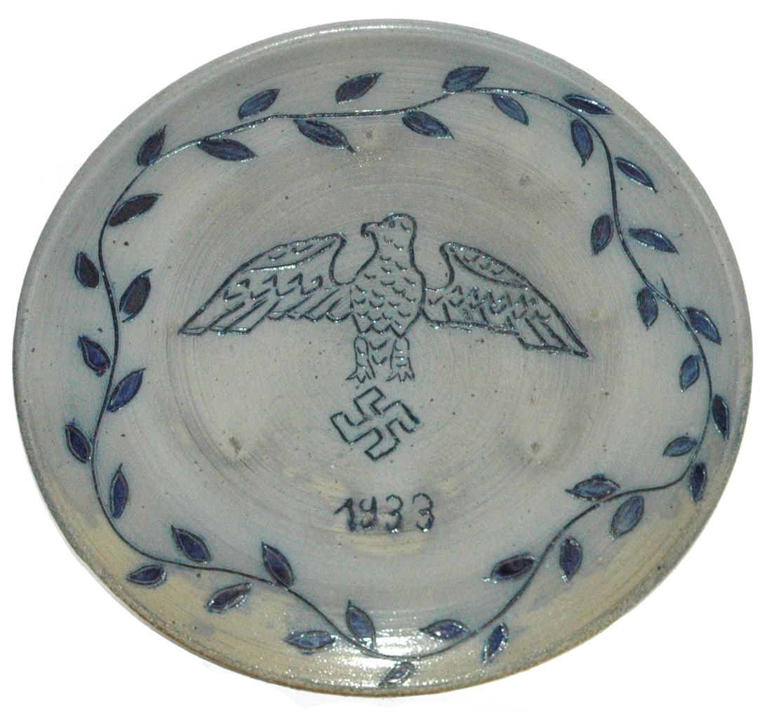 3rd Reich Eagle & Swastika 1933 Plate: Third Reich Stoneware 10 ½” Plate. Scratched eagle and swastika 1933. Mint.