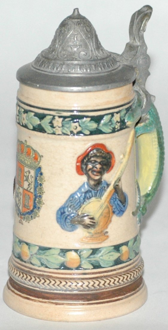 St Augustine Souveinr w Black Boy on Stein: Pottery Relief 1/16 L. Black boy plays banjo. St Augustine Florida shield. Alligator handle. Mint.