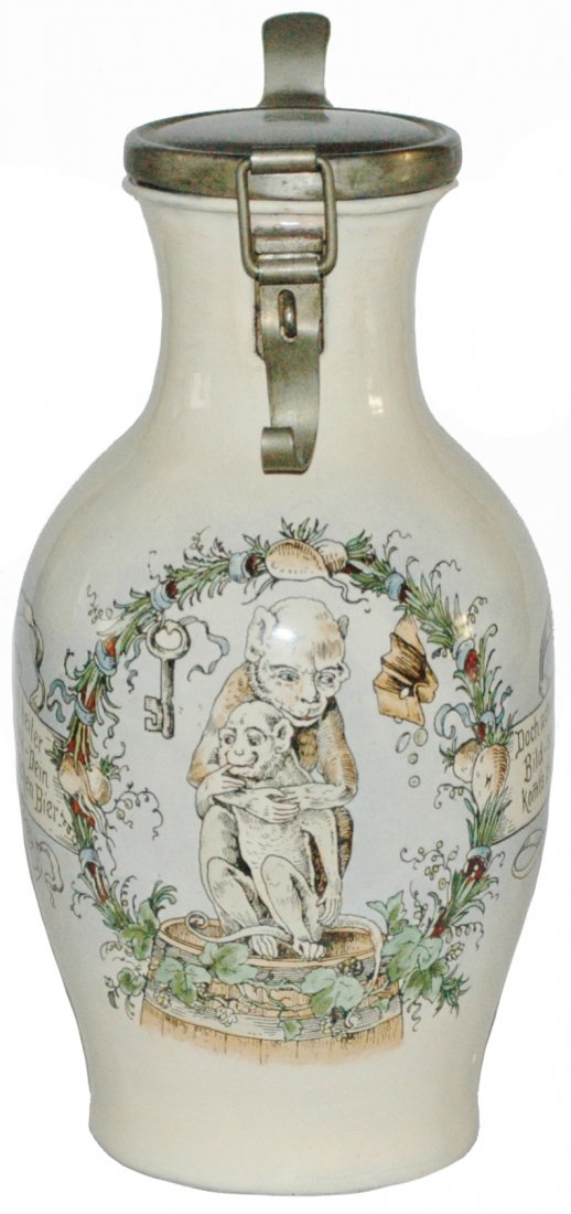 Latched Enameled Tin Stein of Monkeys: Enamel Tin POG 1L. Monkey holds baby monkey. Locking latch. Very good condition.