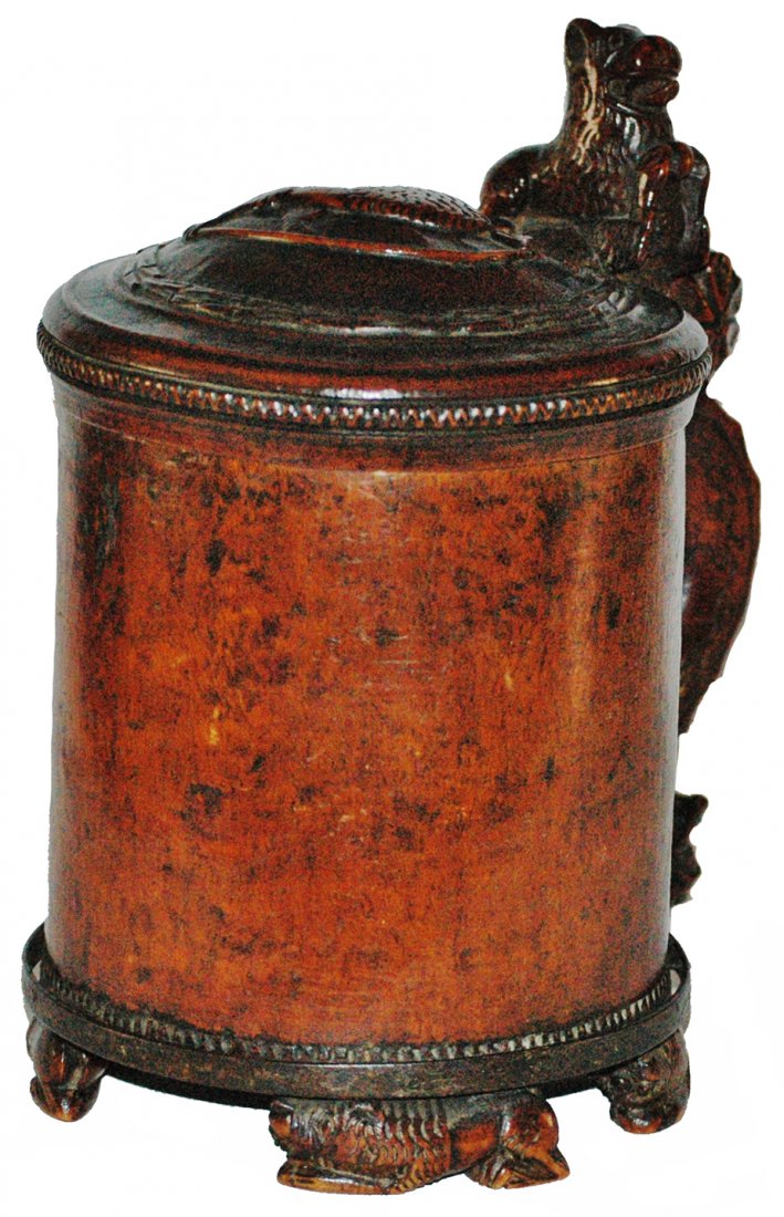 Carved Wooden Scandinavian C. 1750 1-1/4L Stein: Wood Stein 1-1/4L Scandinavian. Burl with carved feet, lid and thumblift. Circa 1750. Normal wear.