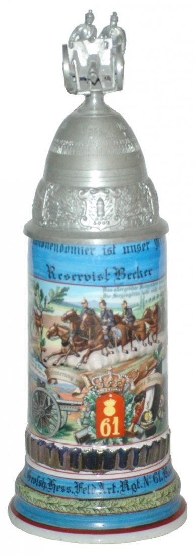 2 Hess Feld Art No 61 Regimental Stein w/ Cannon Finial: Regimental Stein 1/2L Porcelain. “5. Battr. 2. Grossh. Hess. Feld Art. regt. No 61. Babenhausen 1908-10, Reservist Becker.” Four side scenes. Rear roster. Crew top cannon finial. Horse and rider t