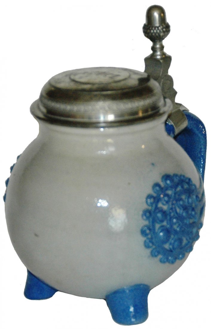 3 Footed Art Nouveau Rimerschmidt Stein: Stoneware #1757 Relief 1/2L. Art Nouveau design with three feet by Richard Riemerschmidt.