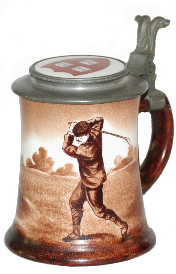 Golfer O'Hara Dial Stein w University Inlay: Pottery O'Hara Dial POG 1/2L. Golfer. Inlay of university shield. Mint.
