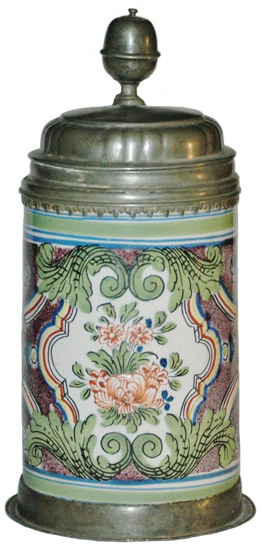 Thuringen 1 L Faience Floral Stein c. 1750: Faience Stein 1L Thuringen Factory. Very busy floral scene around entire body. Circa 1750.