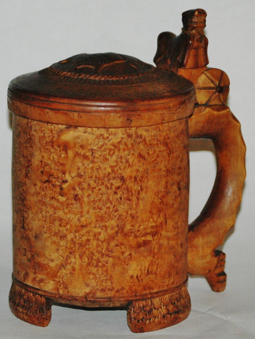 Scandinavian Wood Carved 1780 Stein: Burl Wood 1L. Scandinavian circa 1780. Carved lion feet and thumblift. Normal wear.