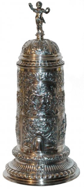 Amazing 4 lbs Silver w Biblical Scenes Stein: Silver 3L 18" Tankard. 4 lbs. 3 oz. Detailed hand chased biblical scenes of Adam & Eve. Lid depicts Abraham offering Isaac on the altar. Cherub finial. Figural angel handle. Silver marks on base. Mint