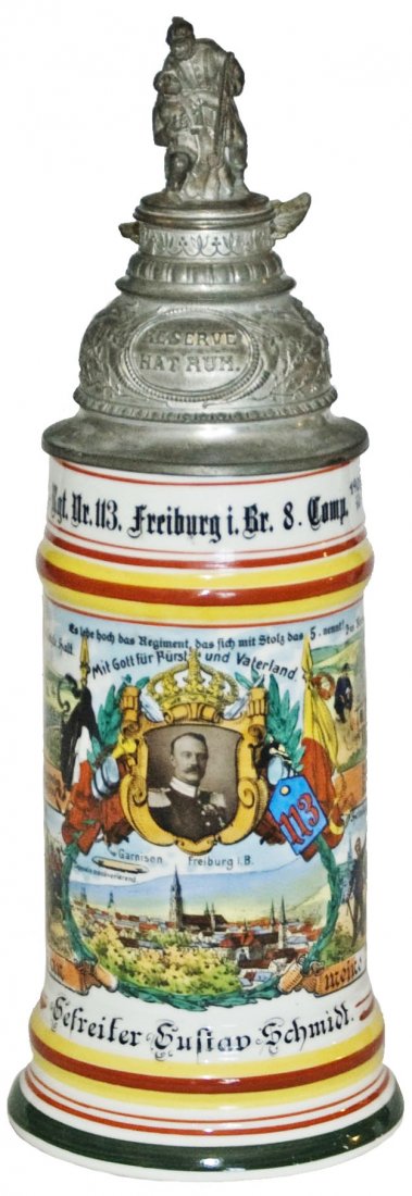 Inft Nr 113 Freiburg 4 Side Scene Regimental Stein: Regimental Stein 1/2L Porcelain. "5. Bad. Inft. Regt. Nr. 113. Freiburg i. Br. 8. Comp. 1908-10, Gefreiter Gustav Schmidt." Four side scenes. Rear roster. Litho lines.