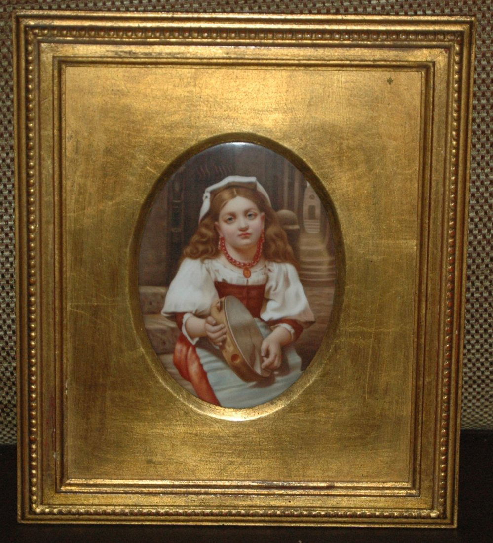 Porcelain Framed Plaque of Woman: Porcelain, Hand Painted, KPM Quality . Plaque. 4 - 1/2” x 6 “ oval. In a 9 - 1/2” x 11” gilded frame. Gypsy girl with tambourine. Mint $300-500