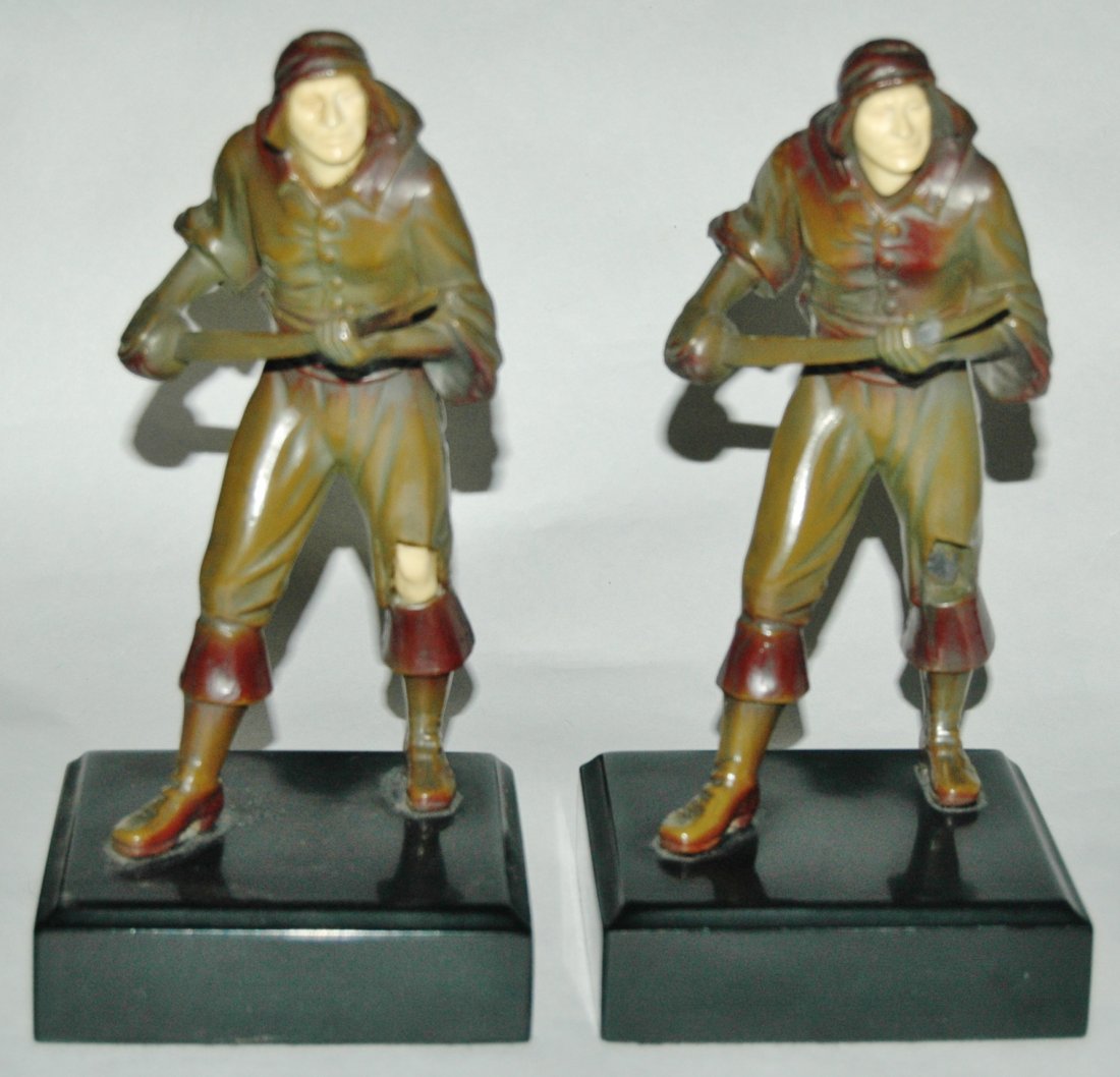 Pair of enameled Bronze 8" figures: Two 8" Enameled Bronze warrior figures. Ivorine faces and knee.