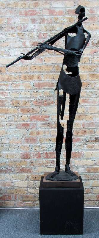 John Balossi Puerto Rica Sculpture 1962: Balossi, John (American / Puerto Rican (from 1960), 1931- ) Welded metal sculpture "Flutist" measuring 53" height (55" with the attached wood plinth, and standing on a 16" base; the total height 80") 