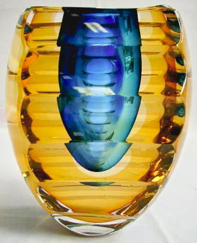 Signed Goran Warff Art Glass Vessel Kosta Boda Uni: Warff, Goran (Swedish, 20th Century) A blown and cut glass vessel measuring 7" height, 5 1/4" width and 4" depth, signed "Goran Warff" and numbered and signed "… 66 121 Kosta Boda Unique"