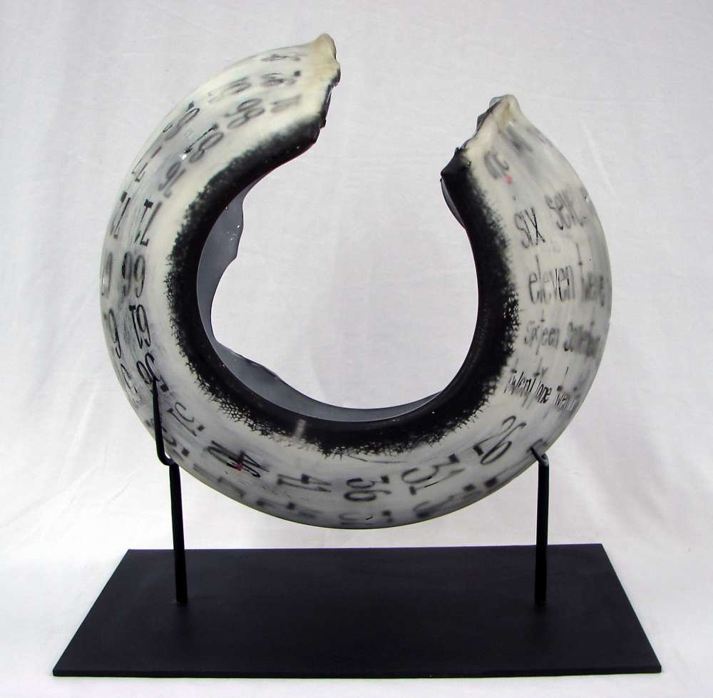 Bridget Boss Open Circular Sculpture "96 years (of): Boss, Bridget (American, 20th Century) signed "Bridget Boss" dated 2000 and with the title "96 years (of) (to) life". open circular form on stand. Height on stand 18" and 15" glass without stand