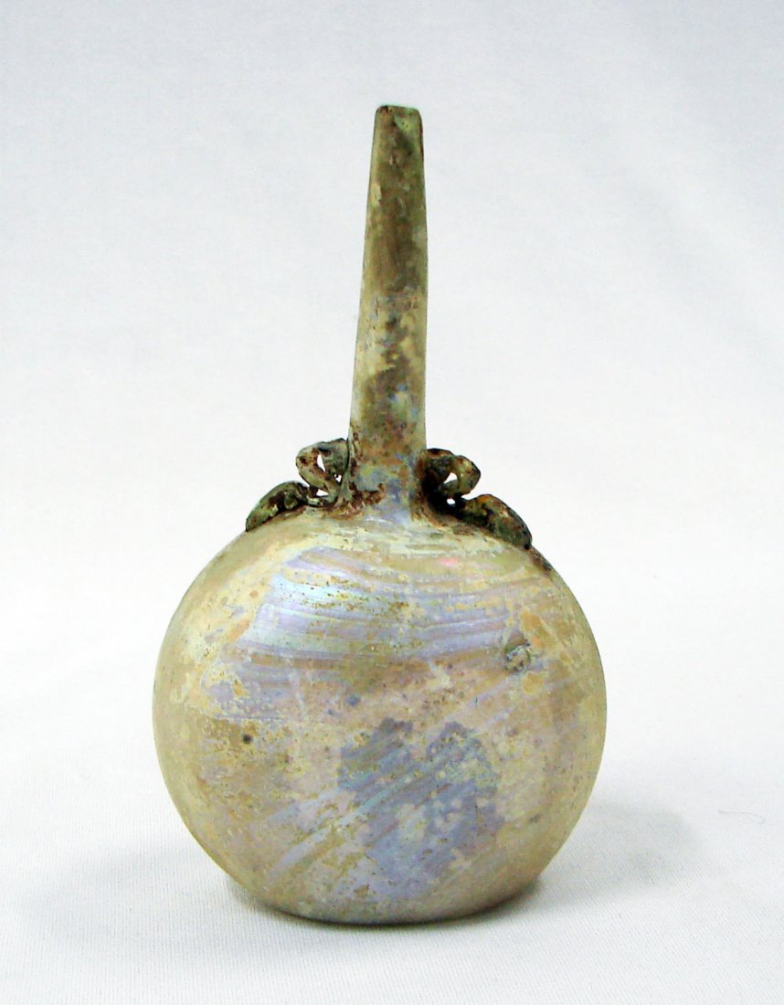 Mamluk "Omom" / Water Sprinkler Ca. 1300 AD Ancient: A mamluk bottle or flask form with tall neck termed an "omom" measuring 5 1/2" height, Islamic Period, 12th-14th century AD. We are confident of the identification of this item but need the opinions o