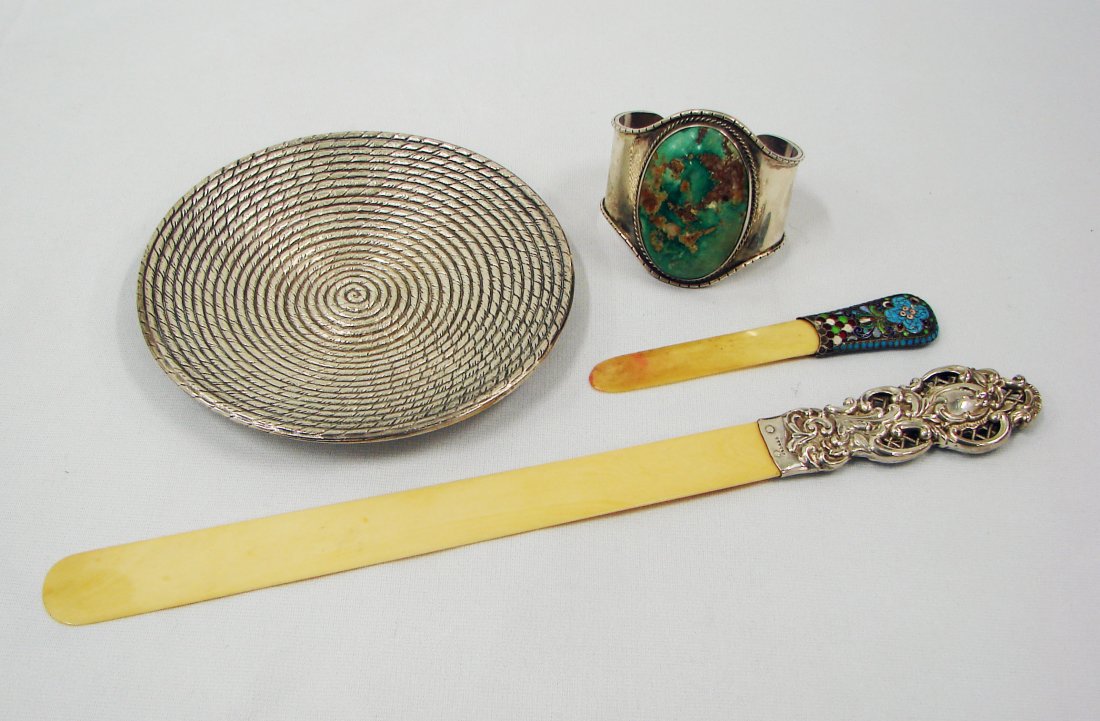 Tiffany Sterling, Russian Enamel Sterling, English : Silver: A Sterling silver 5 3/4" diameter dish with rope motif marked "Tiffany & Co. Makers Sterling Silver) Early 20th century. 250. B Ivory blade paper knife measuring 12 1/2" length with sterling s