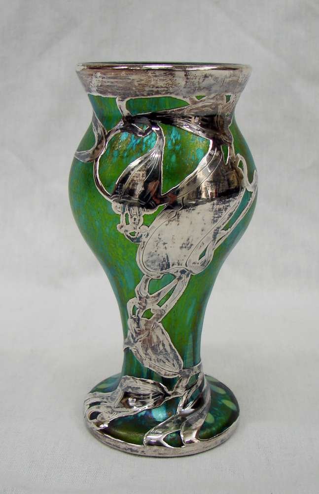 Phanomen Loetz Art Nouveau Sterling Silver Overlay: Phanomen Art Nouveau glass vase with sterling silver overlay and iridescent finish. Very faintly marked “Sterling” and with the “L” mark for LaPierre. The sterling is in a vine pattern. 5 1/2"