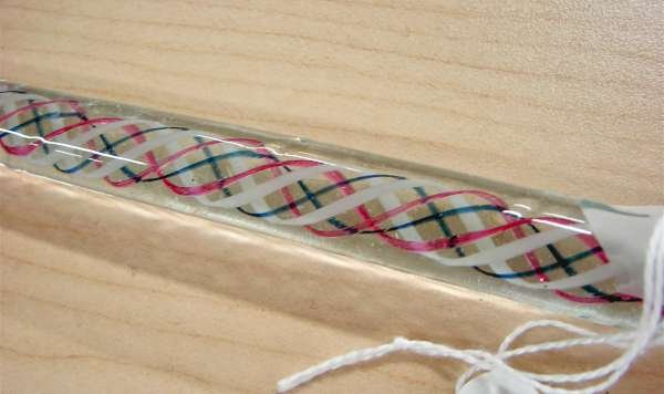 Glass Walking Stick or Cane Red White Blue Walking: Glass cane or walking stick, American, circa 1900. 32 1/2" red white and blue thin twist cane. The photographs include two photographs of all of the canes that we are auctioning - in these two photogr