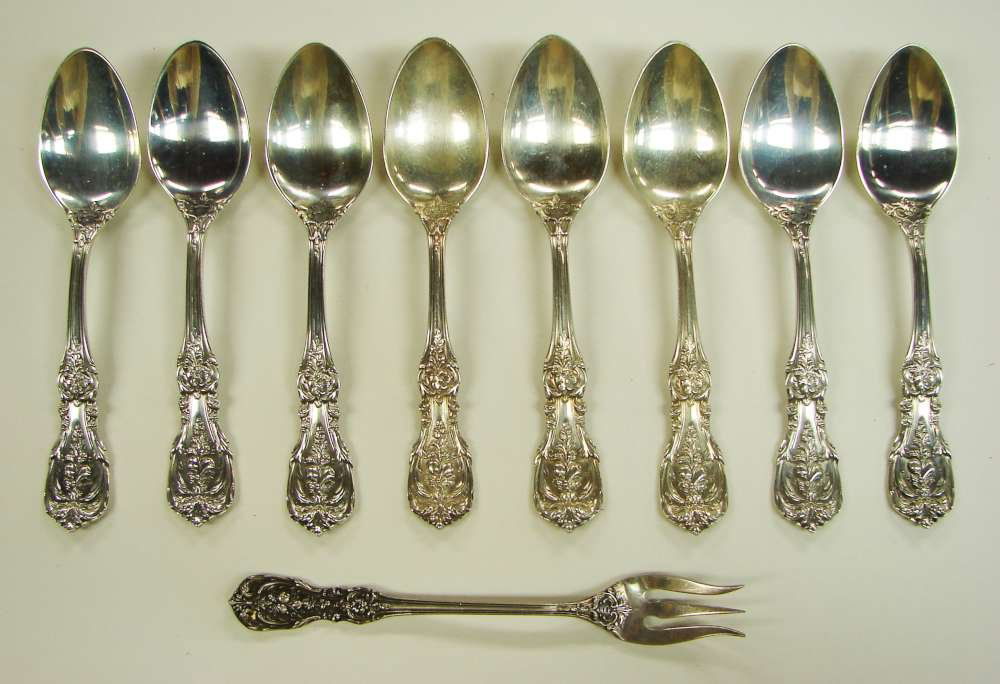 9 Sterling Silver Reed Barton Francis I Items: Nine (9) sterling silver items by Reed & Barton in the Francis I pattern including eight (8) teaspoons, each 6 1/8" length and one olive fork measuring 5 7/8" length. Total weight of approximately 321