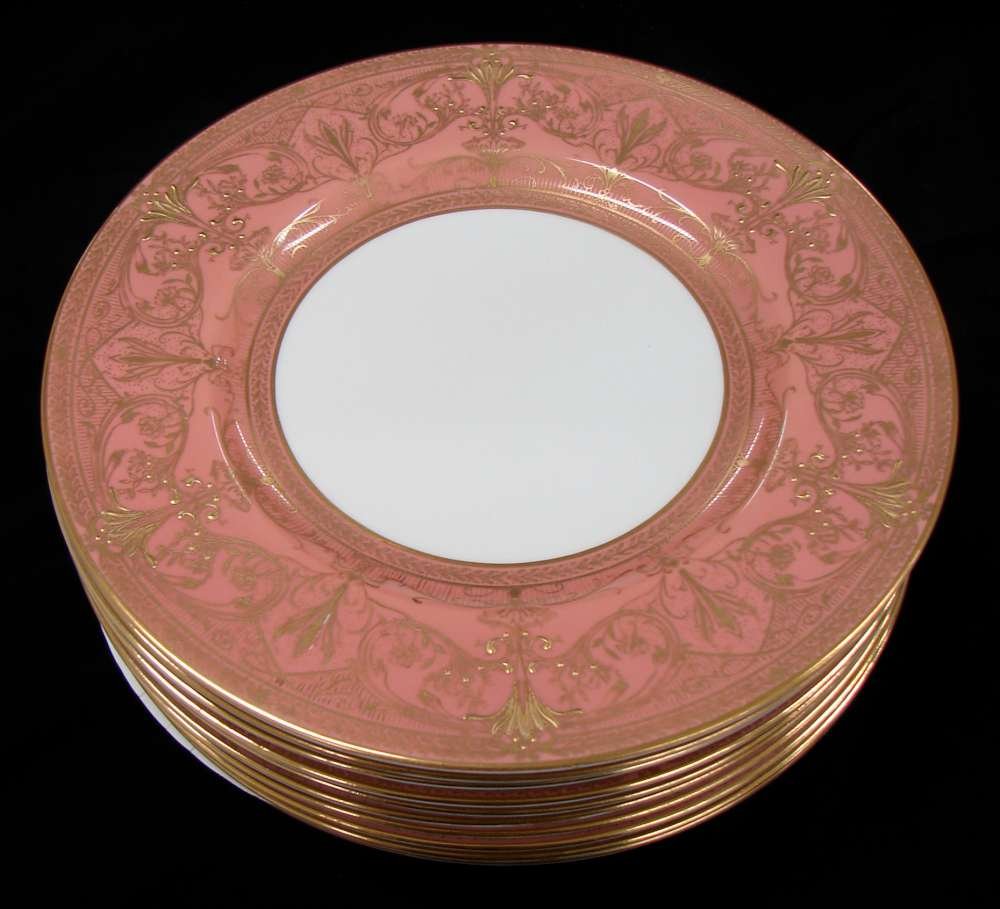 10 Royal Worcester China Raised Gold Service Plates: 10 Royal Worcester bone china service plates with raised gold decoration and ornate trim. Pattern has pink or salmon border. 10 1/2" diameter. Pattern number Z1708.