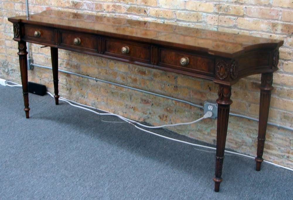 Karges Louis XVI Console Table $9640 Retail Value: A custom made Karges Louis XVI Console or side table measuring 69" length, 33" height and 17" depth. With a center piece that can be removed for the table to be converted to a lesser length (43" from