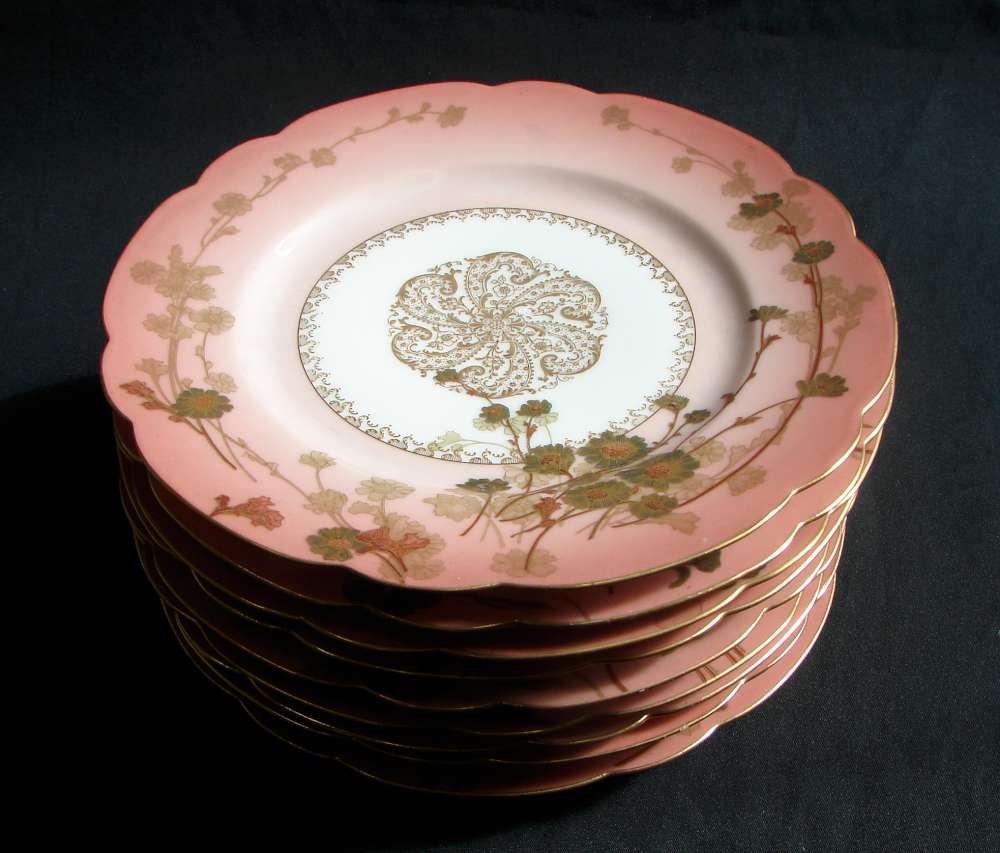 Haviland Limoges Ornate French Raised Gilt Plate Set: Haviland & Co. Limoges French ornate raised gold work, ornate floral work (hand painted) Nine (9) plates, each 9 5/8" diameter and scalloped on the edges.