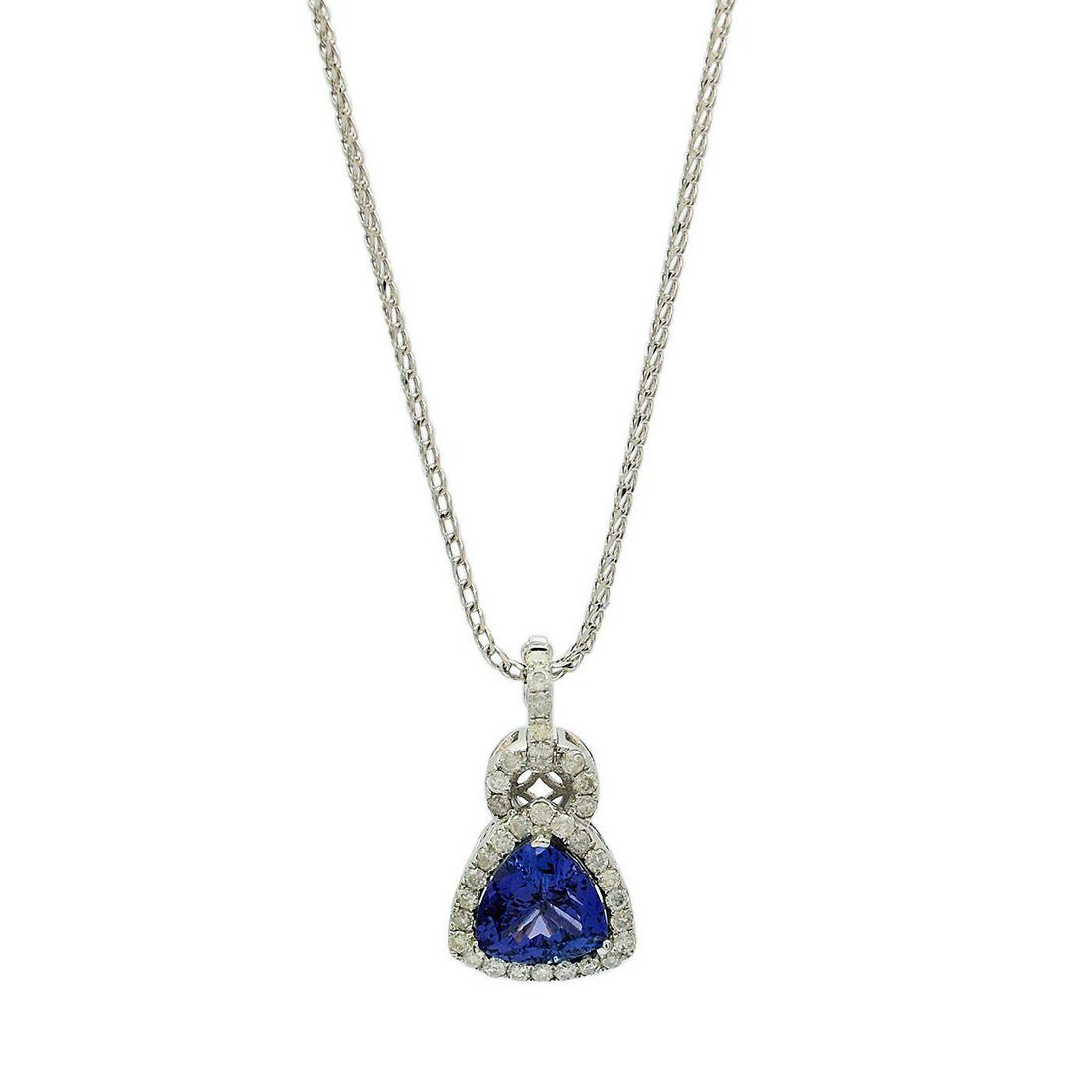 4.31ct Tanzanite and 0.92ctw Diamond 14K White Gold: (K51E16 - P) One electronically tested 14KT white gold ladies cast & assembled tanzanite and diamond pendant/enhancer with chain. The pendant/enhancer features a tanzanite set within a diamond bezel, 