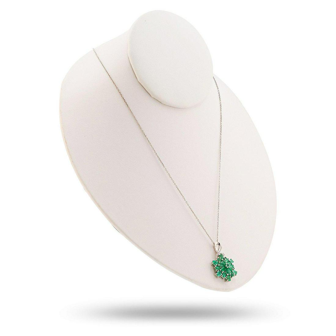 3.50ctw Emerald and 0.05ctw White Topaz Platinum over (1 of 4)