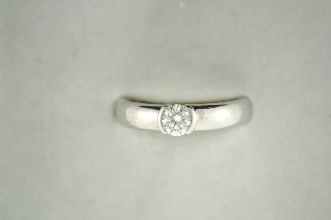 Tiffany & Co. Diamond Solitaire Ring: Tiffany & Co. Diamond Solitaire Ring, set in pure platinum, with a 0.43ct VVS-2 Diamond