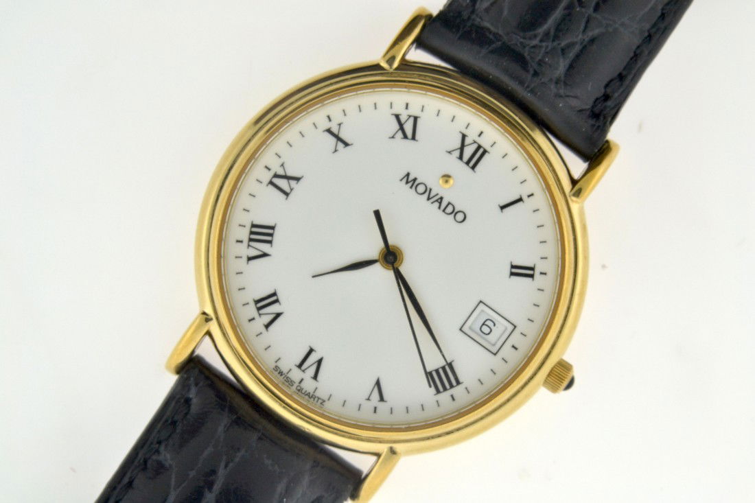 Movado Watch: Genuine Movado watch with leather strap