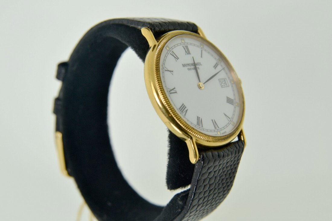 Raymond Weil Watch: 18k gold plated original Raymond weil watch with leather strap