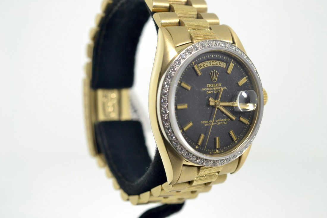 Mens Presidents Rolex Watch Appraised Value: $26,990: 18k gold Mens Presidents Rolex Watch with 1.00 cts of diamonds.