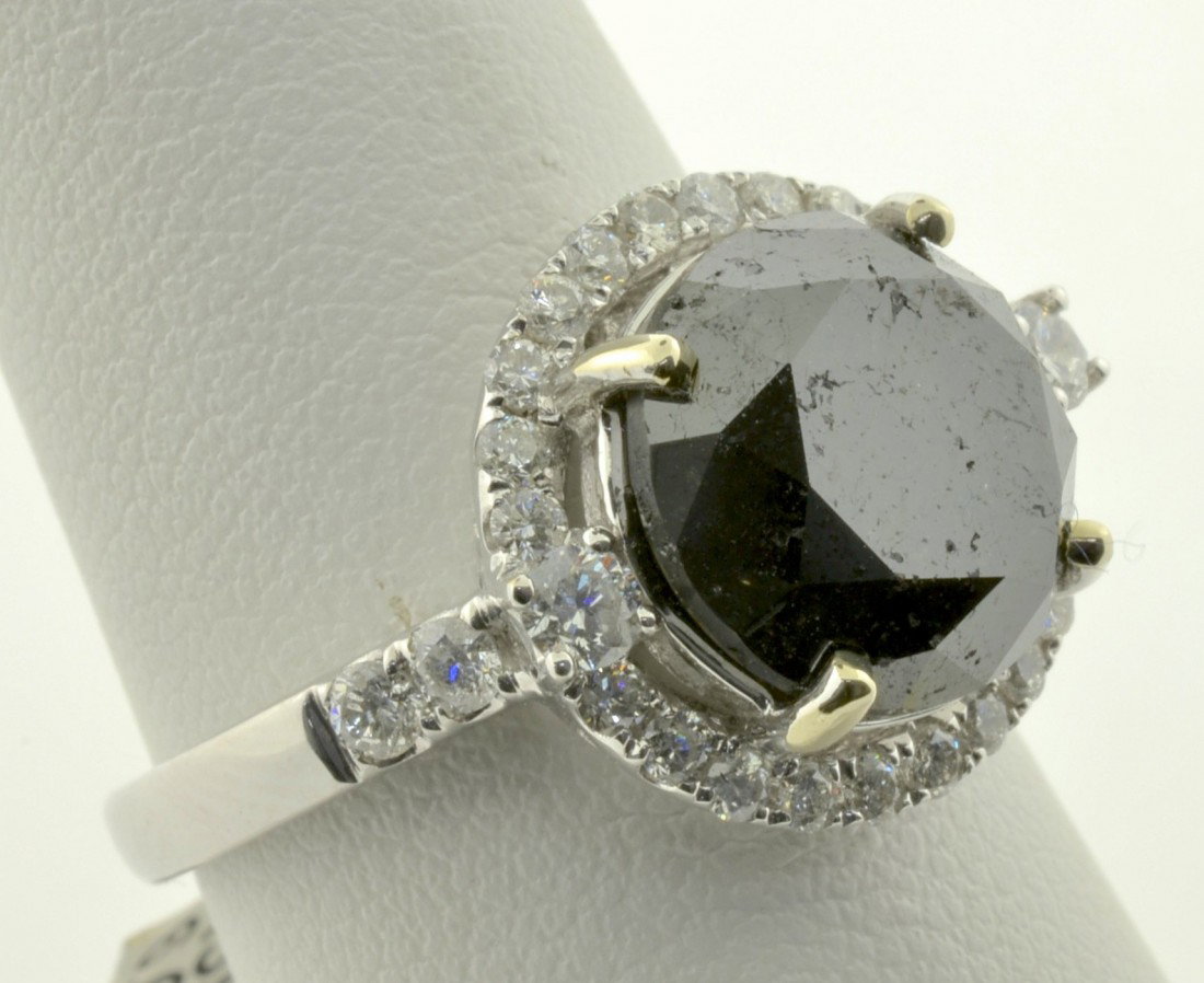Black and White Diamond Ring Appraised Value: $12,250: 14K white gold ring with 6.74 cts of black and white diamonds