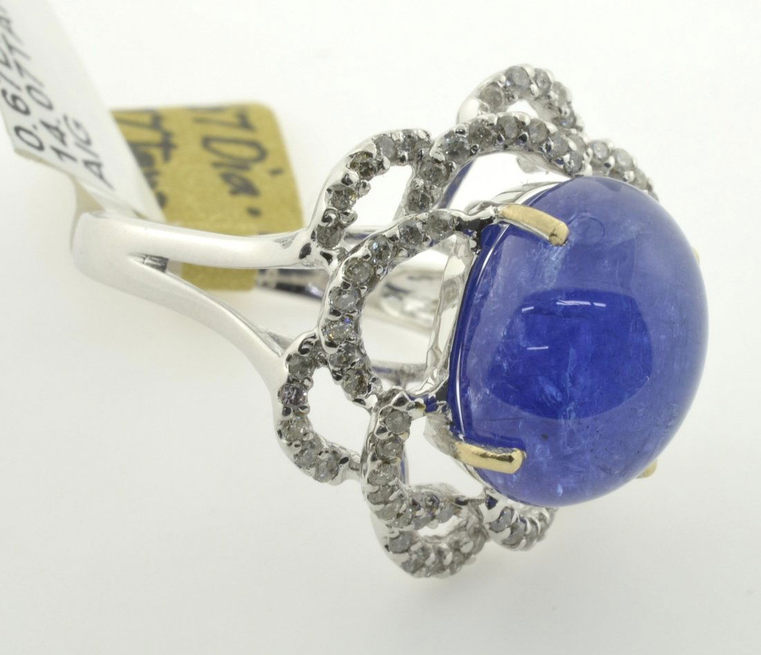 Tanzanite and Diamond Ring Appraised Value: $10,860: 18K white gold ring with 0.67 cts of diamonds and 14.07 ct tanzanite