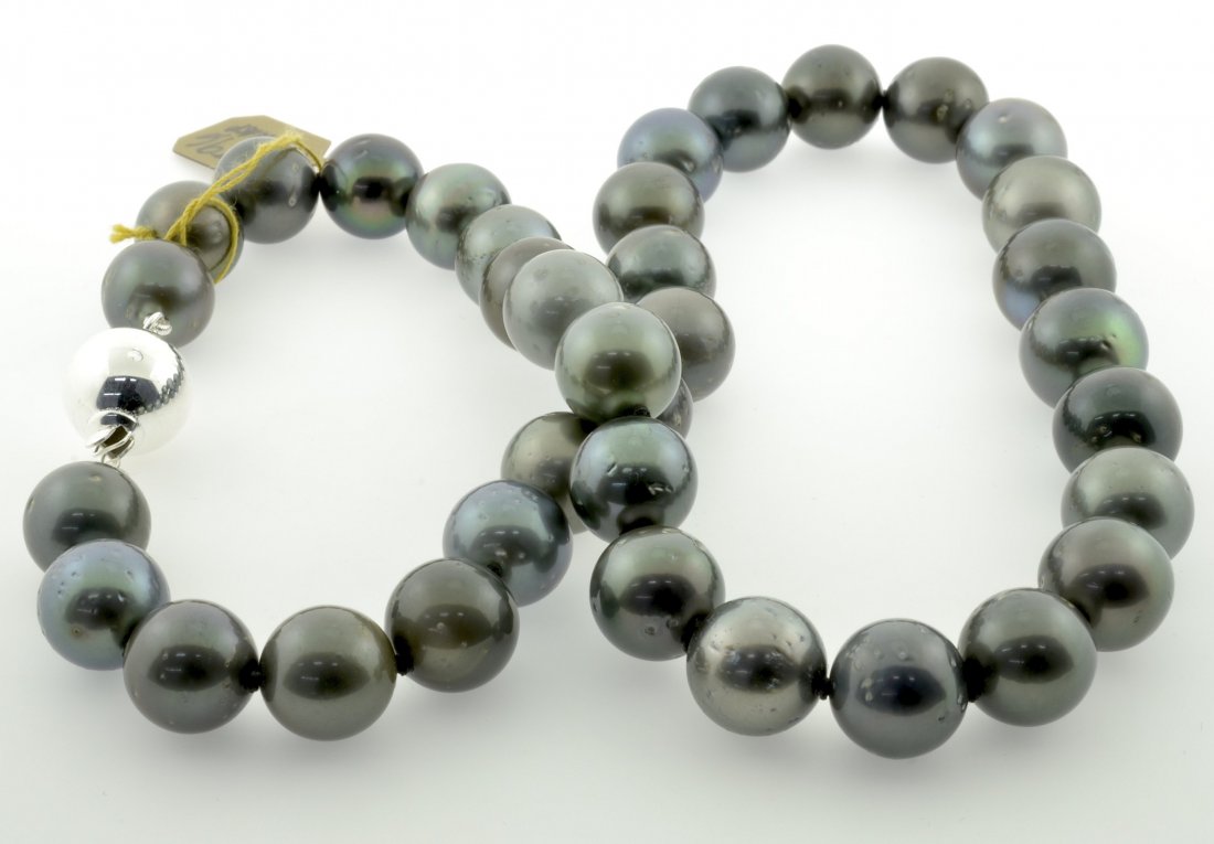 Tahitian South Sea Cultured Pearls Appraised Value: $13: Necklace strand strung and knotted onto a silk thread with 36 genuine tahitian south sea cultured pearls