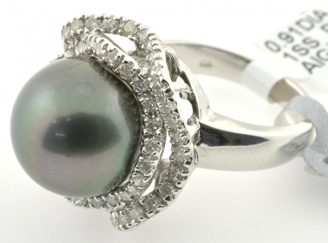 Tahitian Pearl and Diamond Ring Appraised Value: $8,325: 14K white gold ring with a tahitian cultured peard and 0.91 cts of diamonds